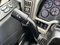 Close-up of a control stalk for windshield wipers on a 2017 International WorkStar 7600 featuring settings for intermittent and low speed operation