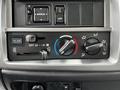 Controls panel of a 2020 Hino 338 featuring knobs for climate settings including air conditioning and fan speed adjustments
