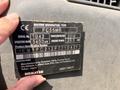 A black and silver data plate displaying specifications and manufacturer details for a 2006 Komatsu PC55MR2 excavator