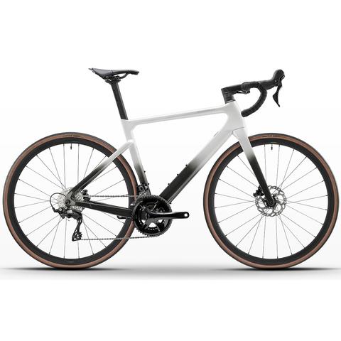 A 2026 Boardman SLR 9.0 Carbon Race Road Bike featuring a sleek design with a gradient finish disc brakes and a modern racing frame