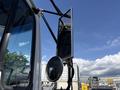 Close-up of the side mirrors on a 1994 Volvo FE 42 showing a reflective surface and mounted structure