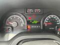 Dashboard of a 2009 Ford Econoline showing speedometer fuel gauge and odometer readings
