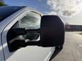 A close-up view of the side mirror of a 2020 Ford F-550