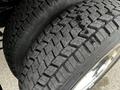 The image shows the rugged tires of a 2019 Ford F-550 displaying deep tread patterns for enhanced traction and durability