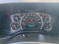 The dashboard of a 2019 GMC Savana showing gauges for speed RPM fuel oil pressure and engine hours
