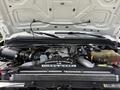 The image shows the engine bay of a 2008 Ford F-250 SD featuring a Power Stroke V8 Turbo Diesel engine with various components and hoses visible