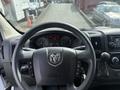 Dashboard and steering wheel of a 2017 RAM Promaster with control buttons and instrument cluster visible