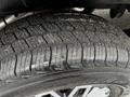 Close-up of a tire on a 2019 Mercedes-Benz Sprinter showing detailed tread pattern and rubber surface
