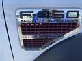 A close-up of the emblem on a 2008 Ford F-450 SD displaying F-450 Super Duty and V8 Power Stroke details