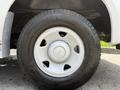 The image shows the tire and wheel of a 2008 Ford F-250 SD with a silver rim and a black treaded tire featuring the manufacturer's logo