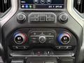 The image shows the control panel of a 2021 Chevrolet Silverado 3500HD featuring climate controls and a touchscreen display