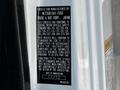 A vehicle identification label for a 2013 Mitsubishi Fuso FE160 displaying safety compliance information and manufacturing details
