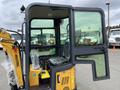 2024 AGT Industrial Yellow H13R Mini Excavator with an open cab revealing the operator seat and control panel