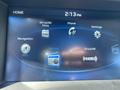 Display screen of a 2017 Genesis G80 showing home menu options including navigation phone settings FM AM and SiriusXM