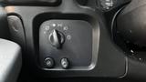 Controls for lights and fog lamps on a 2005 Chevrolet Express van dashboard