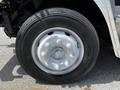 A close-up view of a silver wheel and tire on a 2008 Morgan Olson Workhorse with visible tire tread and lug nuts