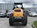 A 2020 Hyundai HR110C heavy machinery vehicle with large rear tires and a prominent brand logo on the back