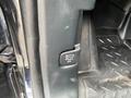 A close-up of the pull handle inside a 2021 Ford Explorer door showing the instructions to pull twice for operation