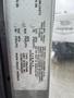 A label detailing specifications and information for a 2012 Ford Econoline vehicle