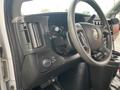 Interior view of a 2017 Chevrolet Express showing the dashboard steering wheel and control panel