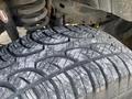 Close-up of a heavily worn tire tread on a 2007 Ford F-350 SD showcasing deep grooves and signs of significant use