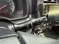 Close-up of the control stalk of a 2021 Toyota 4Runner featuring settings for wipers headlights and other vehicle functions
