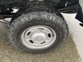 Close-up of a rugged Goodyear tire mounted on a silver wheel on a 2017 Ford F-250 SD