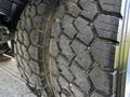 Close-up of the tire tread on a 2018 Ford F-550 showing deep grooves and wear patterns
