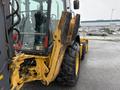 2011 John Deere 310SJ 4x4 Wheel Loader with an extended hoe and a 4 in 1 bucket