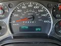 Dashboard of a 2020 Chevrolet Express showing speedometer RPM gauge fuel gauge and digital display with mileage of 157766 and temperature of 27 degrees Celsius