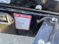 A label showing inspection details for a Southland 18 Foot Dump Trailer including information on tires skin/body paint safety chains decals and VIN number