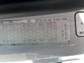 A label displaying specifications for a 2012 Freightliner M2 112 including tire sizes pressure ratings and part numbers