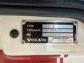 A metal identification plate displaying the model type FL 6 and number 1064217 from a 1994 Volvo FE 42