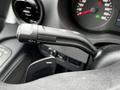 Close-up of the control stalk for windshield wipers and turn signals in a 2020 Mercedes-Benz Sprinter dashboard