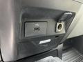 A USB port and an audio input jack on the dashboard of a 2017 Ford F-250