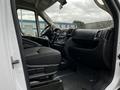Interior view of a 2021 RAM Promaster showing the driver's seat and dashboard with controls and a steering wheel