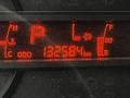 Dashboard display of a 2013 Hino 195 showing an odometer reading of 132584 kilometers with indicators for park fuel and def fluid levels