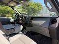 Interior of a 2014 Ford F-250 SD showing the dashboard center console and front seating area with gray upholstery and various controls