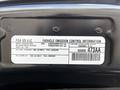 A 2019 RAM 1500 engine emission control information label detailing specifications and regulations related to the vehicle's engine