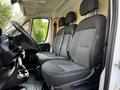 Interior of a 2019 RAM Promaster featuring two comfortable front seats with dark gray upholstery and headrests