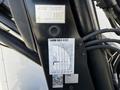 Close-up of a 2012 Freightliner M2 112 showcasing structure details and a label with specifications and a QR code