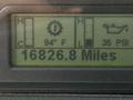 Digital display panel of a 2022 Freightliner B2 showing temperature fuel and oil pressure gauges along with mileage reading of 16826.8 miles