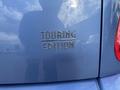 Close-up of the rear badge on a 2007 Chrysler PT Cruiser displaying the text TOURING EDITION in a bold font
