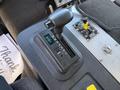 Gear shift lever and control panel of a 1994 Volvo FE 42 displaying indicators for drive modes including reverse neutral and various drive gears