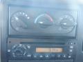 Dashboard controls of a 2014 International Durastar featuring climate control knobs and a radio display showing the time 914 PM