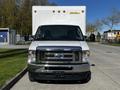 A 2019 Ford Econoline van is shown from the front with a white box cargo area attached and a chrome grille