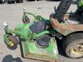 2012 John Deere 1445 Series II 4WD utility vehicle with a mowing deck and front wheels designed for landscaping and rough terrain