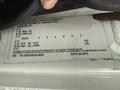 Image of a 2014 International TerraStar with a vehicle information label displaying specifications and VIN details