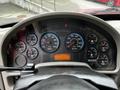 Dashboard of a 2011 International 4400 with various gauges displaying RPM speed fuel and other metrics