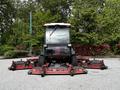 A 2012 Toro Groundsmaster with a large cutting deck and multiple mowing blades positioned in the front, designed for maintaining lawns and large turf areas
